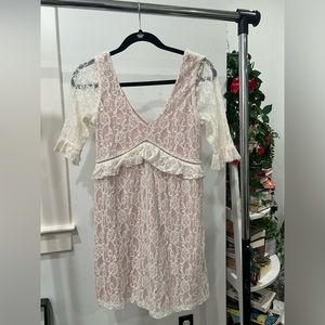Xtraordinary white lace mini dress